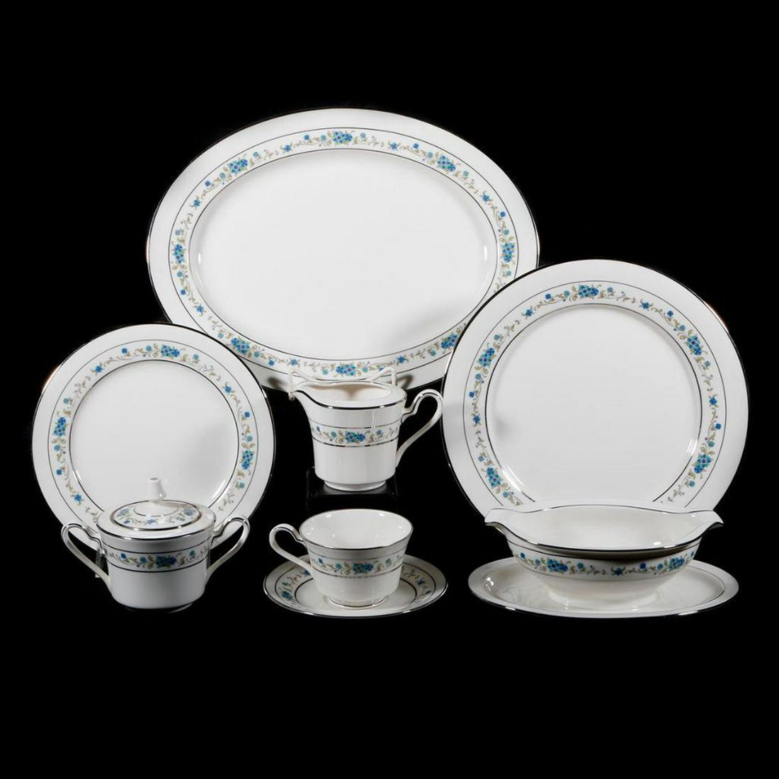 Set of Japanese Noritake china.: A 93 piece Mid century Japanese Noritake porcelain dinner set consisting of 12 dinner plates 12 salad plates, 12 teacups, 12 saucers, 12 finger bowls, 12 soup bowls, 12 base plates, 5 serving pieces,