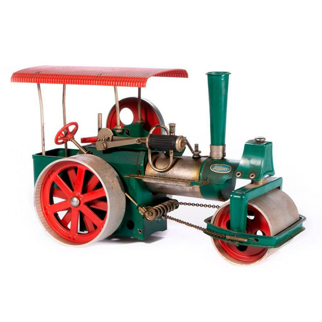 Vintage model toy steam roller.: A vintage German Walesco model toy steam roller. 8 inches high x 13 x 6. Items are sold as is. Please inquire about condition if not otherwise stated.