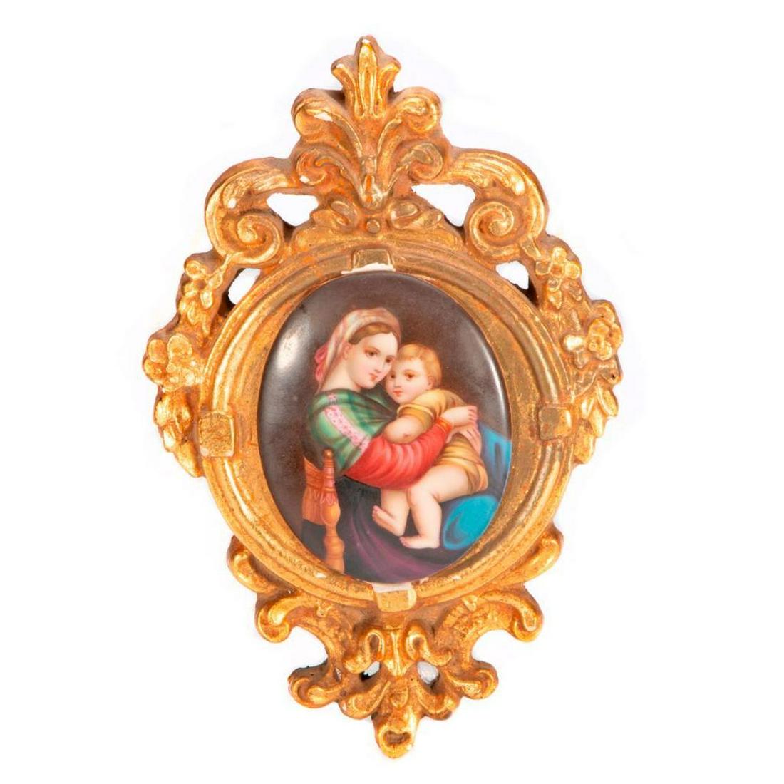 Porcelain Painted Portrait Plaque: Oval Plaque of Madonna Dell Sedia after Raphael mounted on a gold composite panel. Overall - H-7.5" W-5" Plaque - H-3.25". W-2.75" Condition: Very Good