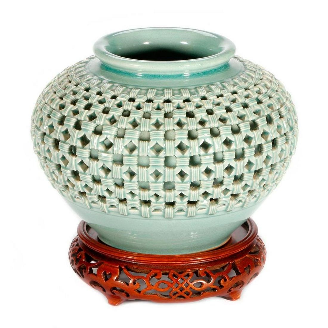 19th century Korean bowl.: A 19th cenrury Korean "braided porcelain" bowl measuring 6 inches high x 8. Stand included.