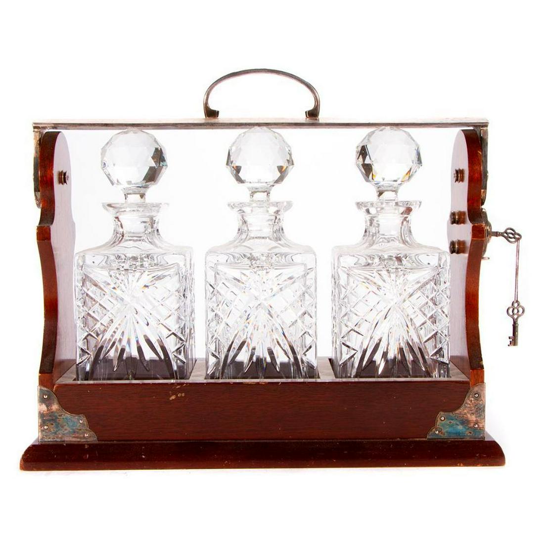 A locking Tantalus decanter set. (1 of 6)
