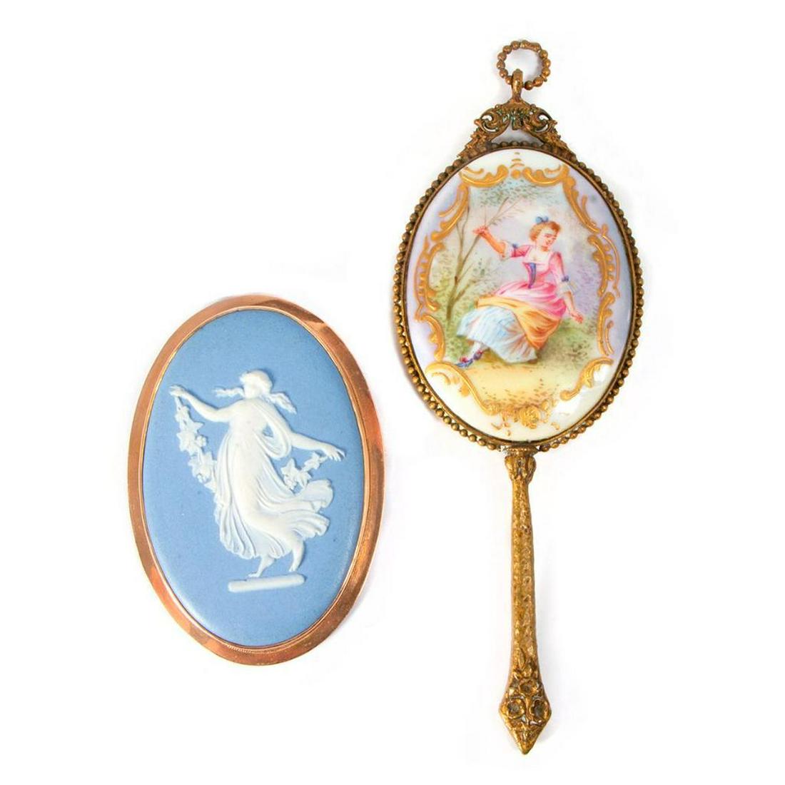 A Wedgewood brooch and a mirror. (1 of 6)