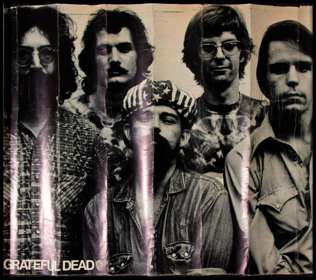 Grateful Dead.: A 1971 Warner Brothers Grateful Dead promotional poster. Size: 21" high x 26". Condition: Fair with edge tears and fold creases throughout.