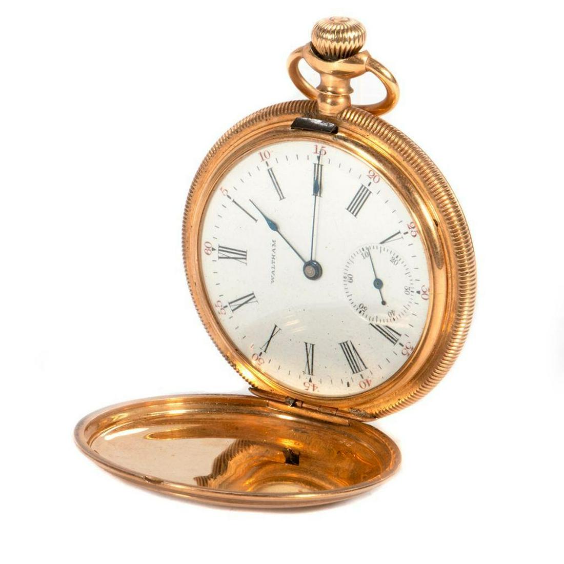 Waltham 14k gold hunting cased pocketwatch (1 of 5)