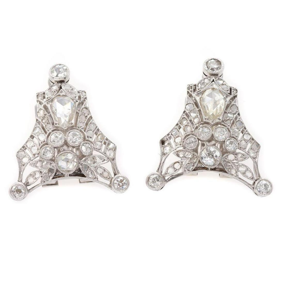 Vintage pair of diamond and platinum clip brooches (1 of 3)