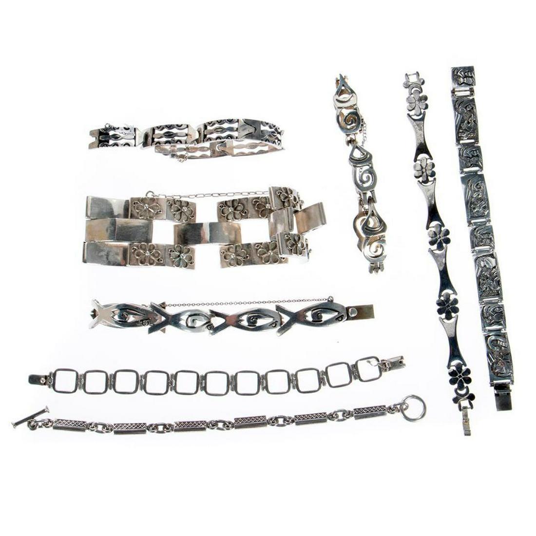 Eight sterling silver link bracelets: makers including: CGJ, MES, A. Munos, TT, Mexico; gross weight approximately 300 grams