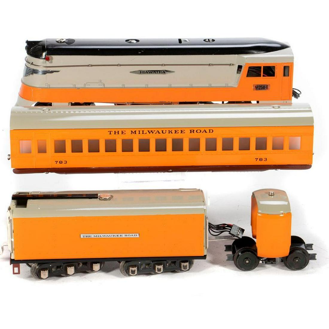 O Gauge Pride Lines Hiawatha 250-E Locomotive, Tender,: Locomotive has edge wear with paint nicks and has tether cable to Tender, Coach with bag and wrap, Vestibule. All very clean