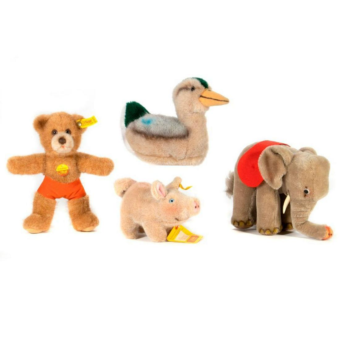 Vintage Steiff, Lot of 4: Group of four vintage Steiff animals, Duck, Teddy Bear, Pig, and Elephant, all retain original tag and button. Largest measurement at 7.5 inches.