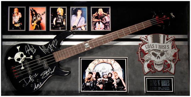 Guns N' Roses signed guitar: Guns N' Roses Band signed framed guitar. Frame: 26 x 48 inches Depth: 4 inches