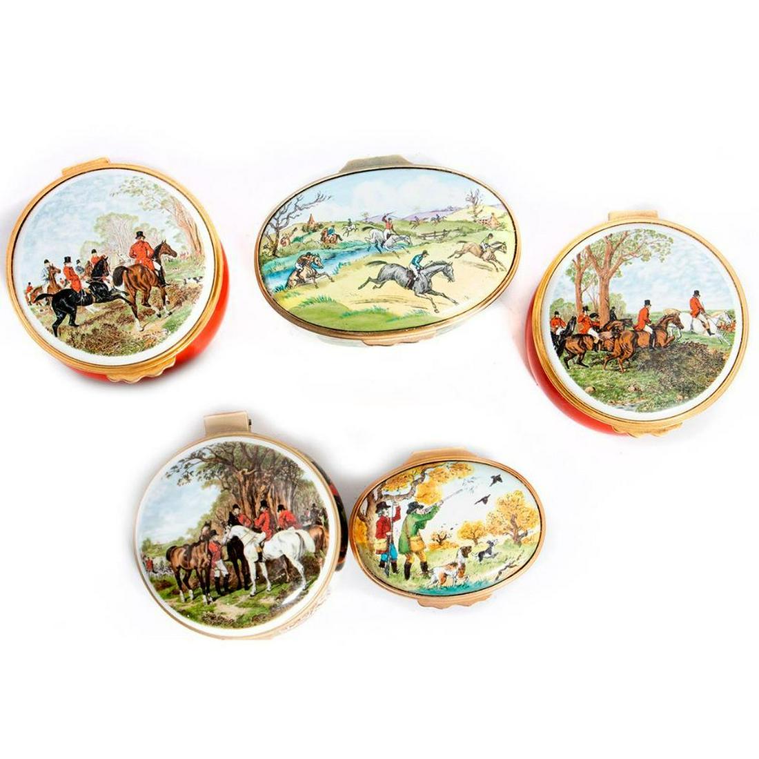 Worcester and Battersea Enamel Boxes: A collection of five, each decorated with scenes of the hunt. Greatest height 1 1/2in. length 3in. Condition: All in very good condition
