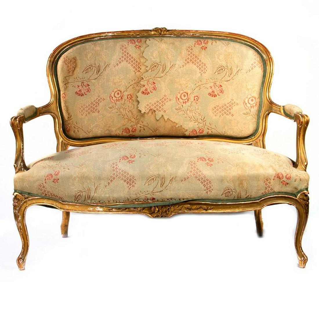 Louis XV Style Giltwood Settee: 32in. h. 46in. l. Condition: Chips to gilding overall, fading to upholstery.