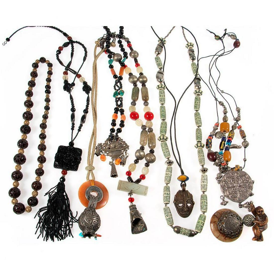 Collection of ethnic and Chinese jewelry: 39 pieces, including jade, cinnabar, turquoise, coral, carnelian and silver