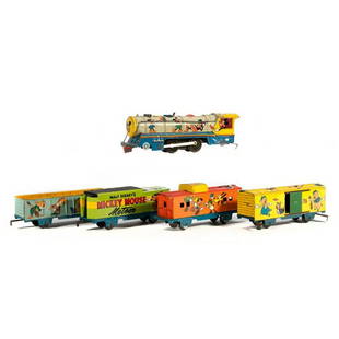 Marx Mickey Mouse windup Locomotive and Tender, Boxcar,: Mickey Mouse Meteor windup Locomotive and Tender. Built in key has rust and is bent. Locomotive graphics are Mickey and Minnie Mouse, Goofy, Donald Duck, Huie, Louie and Dewey. Worn around the edges,