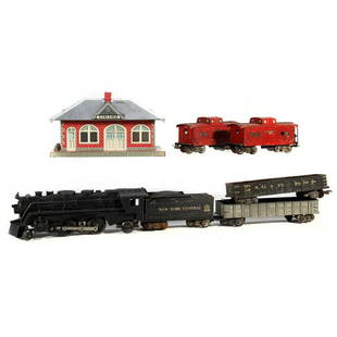 Marx train cars and Girard whistling station: Marx 666 2-4-2 locomotive, NYC scale tender, B&O 254000 scale Gondola, NKP 71499 scale Gondola, (2) 92812 Reading scale Caboose. Girard whistling station 666 smoking 2-4-2 die cast locomotive. scuffs