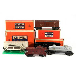 Lionel train cars: Lionel 6456 Black LV Hopper, 3472 Automated Milk Car and Platform, X6454 Brown NYC Box Car, 6465 Sunoco silver two dome tank car, 6357 Lionel Caboose. 6456 Black Lehigh Valley Hopper. Brake wheel,