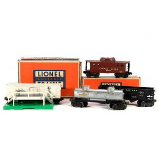 Lionel train cars: Lionel 6417-25 Lionel Lines Porthole Caboose, 3472 Automated Refrigerated Milk Car with platform, 6465 Silver Sunoco Two Dome Tank Car, 6456 Black LV Hopper 6417-25 Tuscan N5c Lionel Lines Porthole