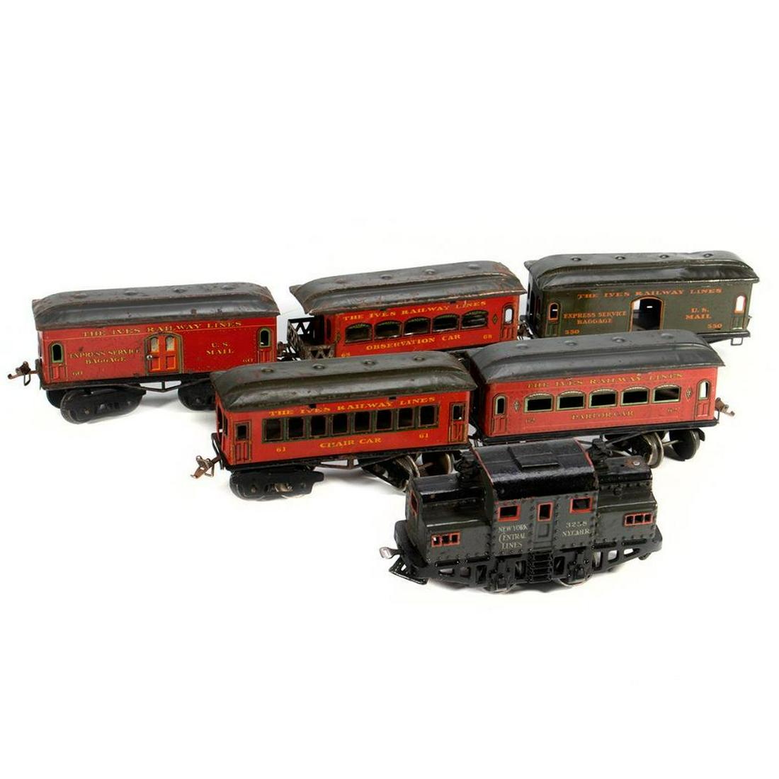 Ives train cars: Ives 3238 Locomotive, 550 Baggage Car, 60 Baggage Car, 61 Chair Car, 62 Parlor Car, 68 Observation Car 3238 New York Central Lines Locomotive. Gray with red trim and black frame. Paint has chips and w