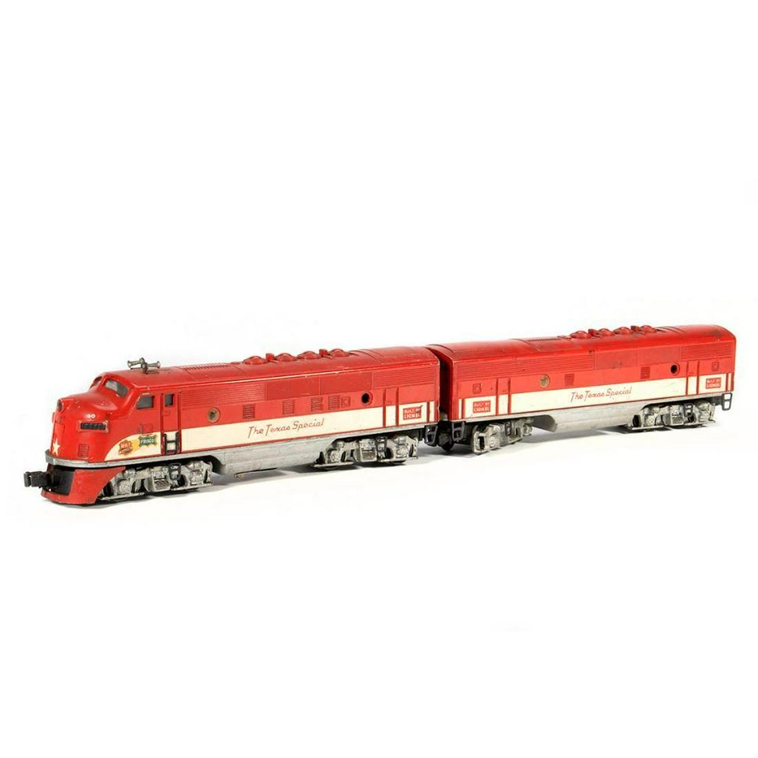 Lionel 2245 Texas Special F3 A Unit, 2245 Texas Special: Lionel 2245 F3 Powered A Unit. Red and White. Has 3 of 4 portholes. Steps, horns, trucks and couplers - intact. Corrosion in battery compartment. Paint has scrapes and wear. Decals present. Dirty. Cou