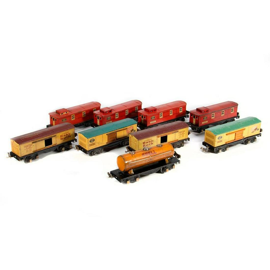 Lionel train cars: Lionel 1680 Shell Tank Car, 1679 Baby Ruth Box Car, 1679 Baby Ruth Box Car, 1679 Baby Ruth Box Car, 1679 Baby Ruth Box Car, 1682 Caboose, 1682 Caboose, 1682 Caboose, 1682 Caboose Lionel 1680 Orange Li