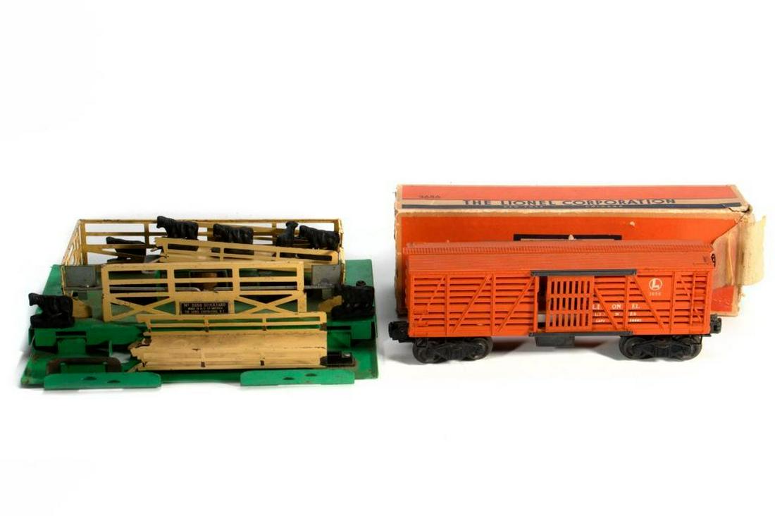 Lionel 3656 Cattle Yard, 3656 Stock Car: 3656 Cattle Yard. Has base and two ramps but missing top cattle yard. No contact blades. Dusty. 3656 Cattle Car. Roof walk ends, brake wheel, doors, door guides, coil cover, trucks and couplers intact