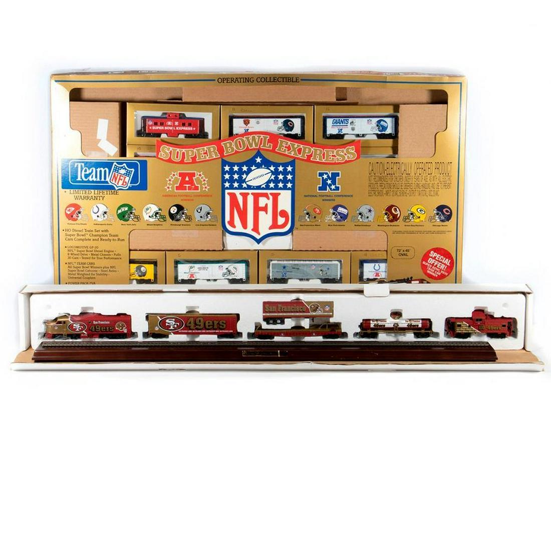 HO Scale 49ers Commemorative Set, NFL Super Bowl: Danbury Mint San Francisco 49ers commemorative set. Locomotive, box car, flat car with container, tank car and caboose with 36" display track mounted on wood. Mantua Super Bowl Express set with Locomo