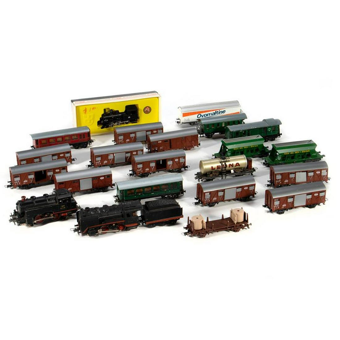 German and Austrian HO Scale train cars: German and Austrian HO Scale - (10) Box Cars, (2) Hoppers, Tank Car, Flat Car (5) Passenger Cars, (3) Locomotives, Ovalmaltine Container Car