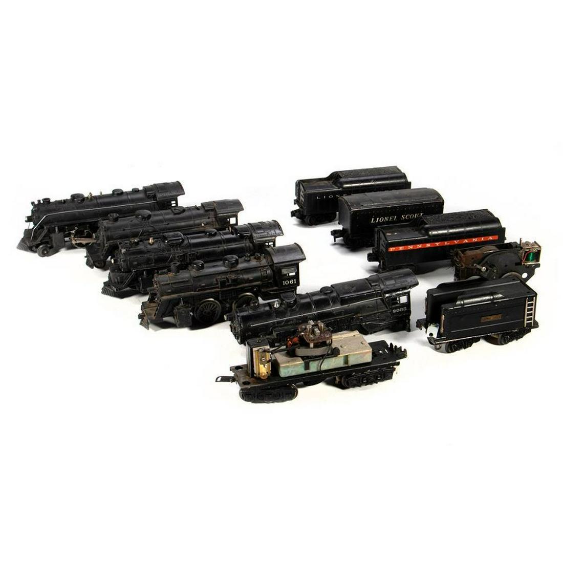 Lot of Locomotives for parts: Lionel 1666 2-6-2 Locomotive, 2026 2-6-4 Locomotive, 2035 Shell, 243 Locomotive, 1061 Locomotive, Tin Scout Tender, Motor Chassis, Whistle Tender Chassis with no shell, Tender with loose shell, Pennsy