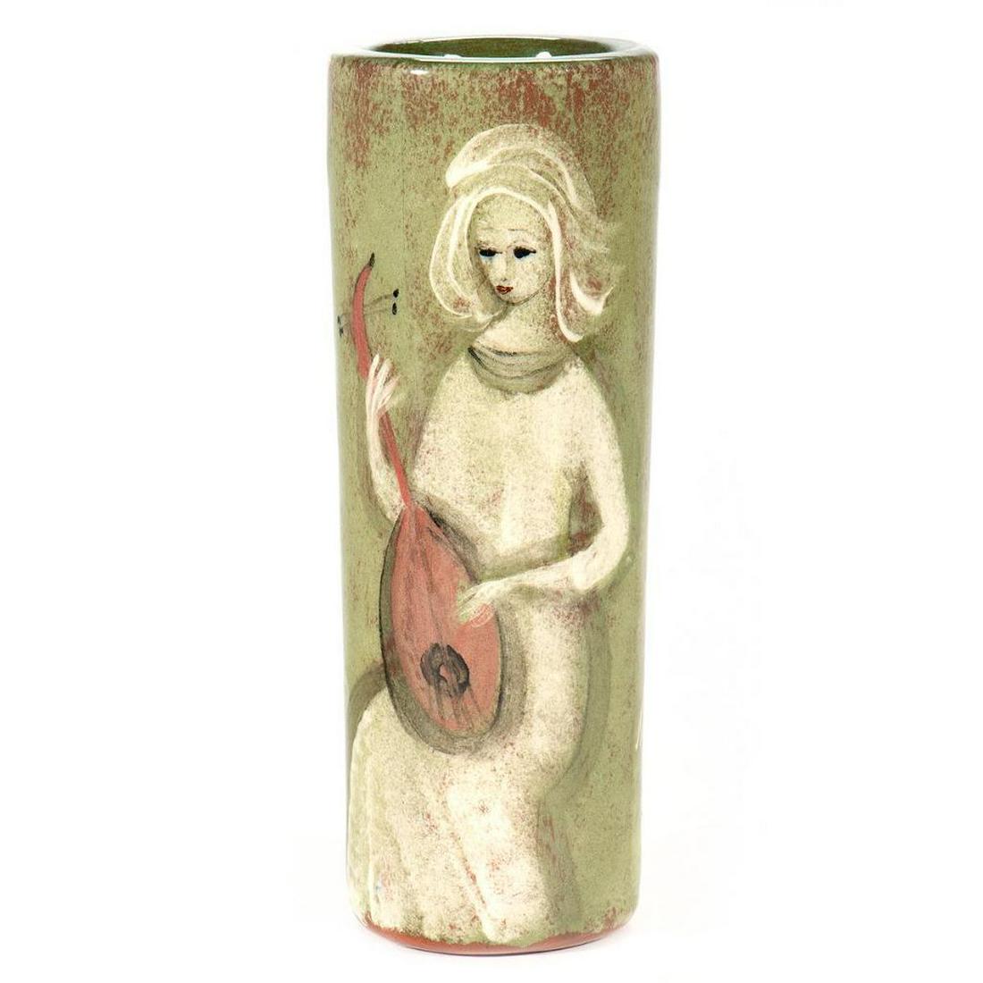Polia Pillin Mid-Century Ceramic Vase: Polia Pillin (1909-1992) Polish American The thickly potted cylinder decorated with a woman playing mandolin and a horse in her delicate painterly style. Signed underglaze on base. 7 1/2in. (19cm)