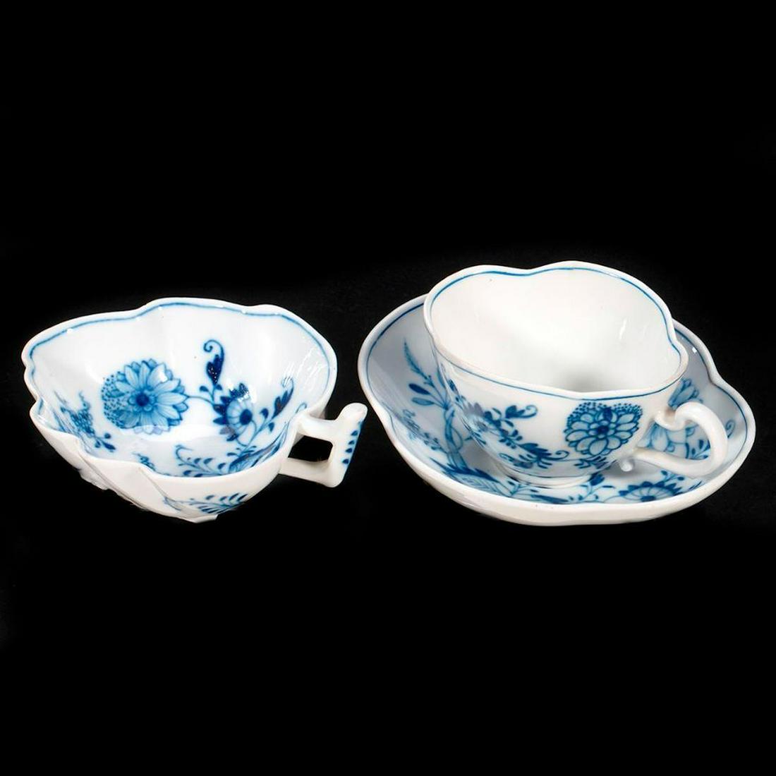 Meissen Porcelain Tea Cup and Saucer: The cup and saucer together with a small dessert bowl. Greatest height 2in. (5cm) Condition: Very good.