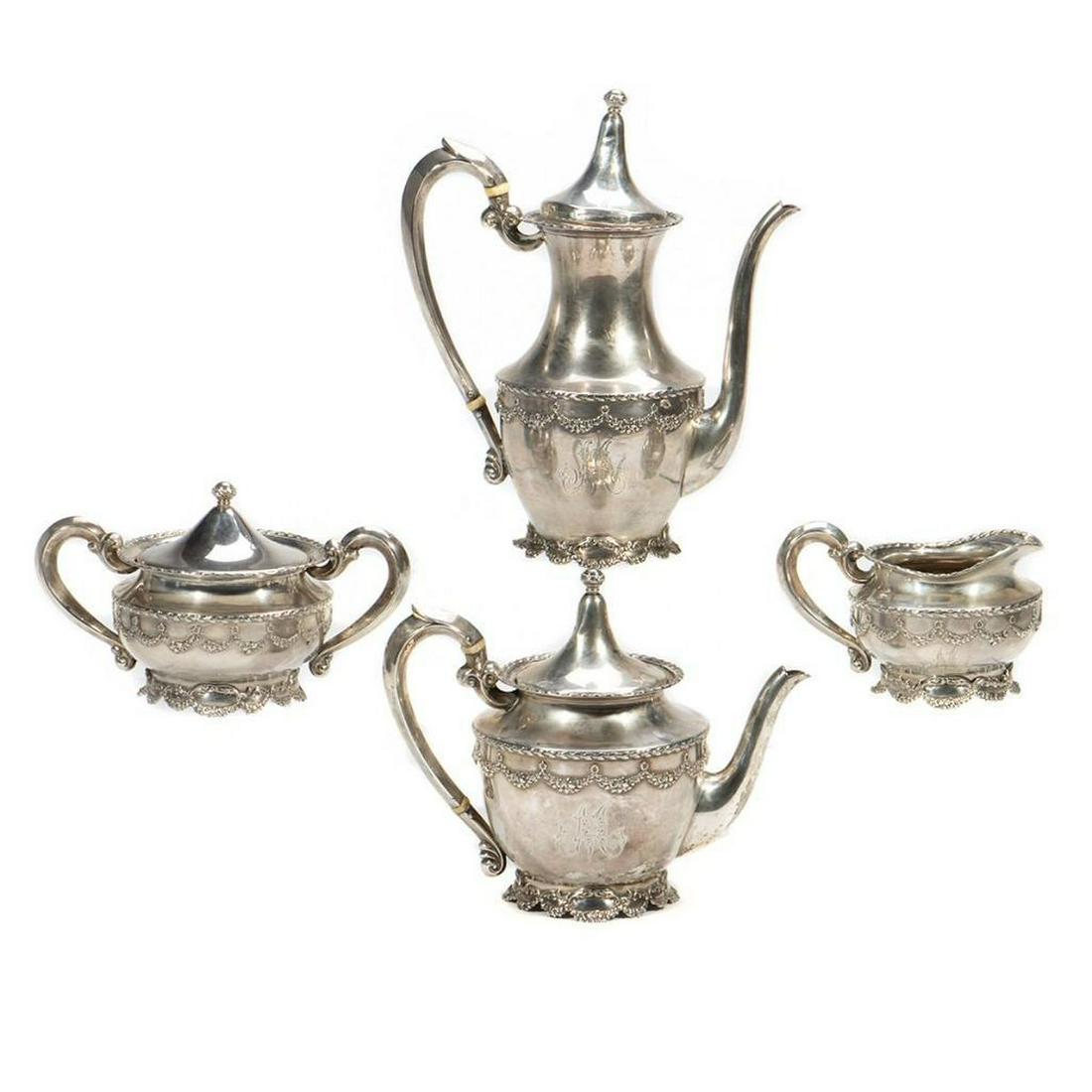 Shreve & Co San Francisco Sterling Silver Tea and: Shreve & Co San Francisco Sterling Silver Tea and Coffee Service. Coffee pot 9"h., Teapot 6"h., Sugar bowl 4.25"h., Creamer 3.25"h., Total weight 1062 g.
