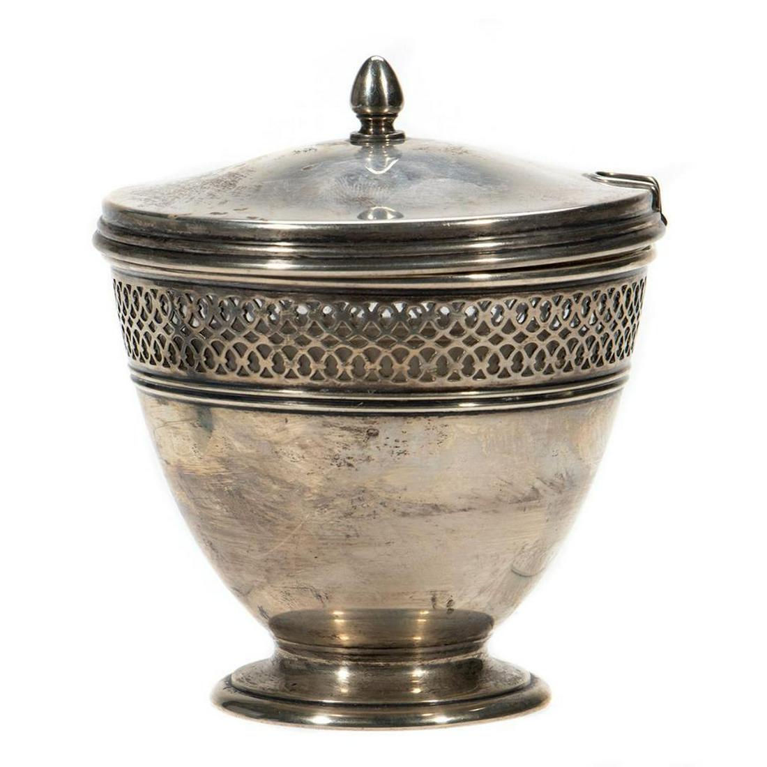 Tiffany Sterling Mustard Pot: Neoclassical design with glass liner. Stamped on base, Tiffany & Co. 18423 Makers Sterling 925-1000 M 6in. (15cm) h. 258 grams. Condition: Very good, light tarnishing