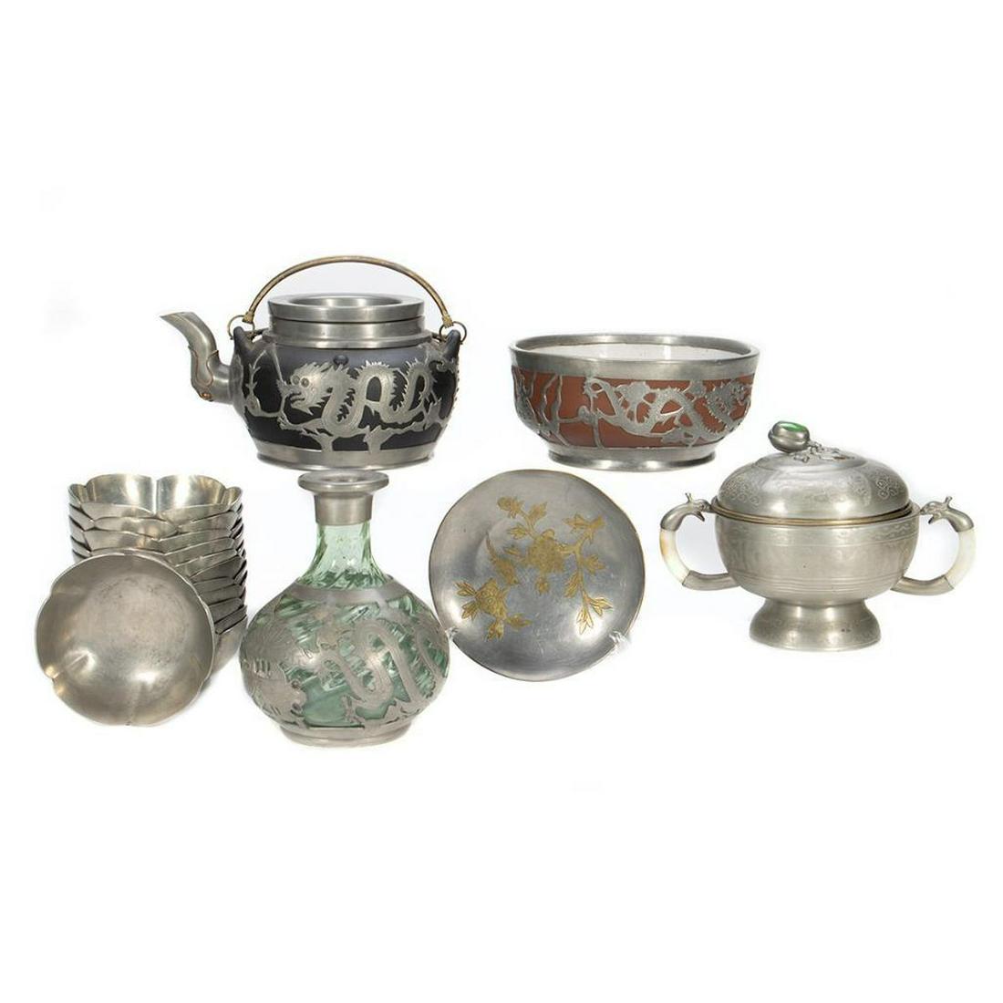 Chinese Pewter Collection: Including twelve soup bowls, Tea pot and Caddy, and overlay glass vase.Greatest height 7in (18cm)