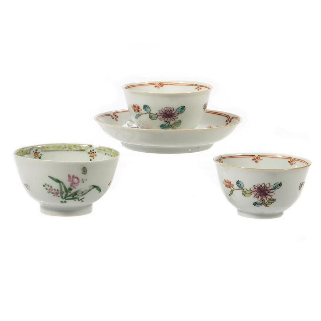 A Collection of Export Porcelain: Including three tea bowls and a saucer, all with floral decoration. Greatest height 2in. Condition: one chip on one teabowl.
