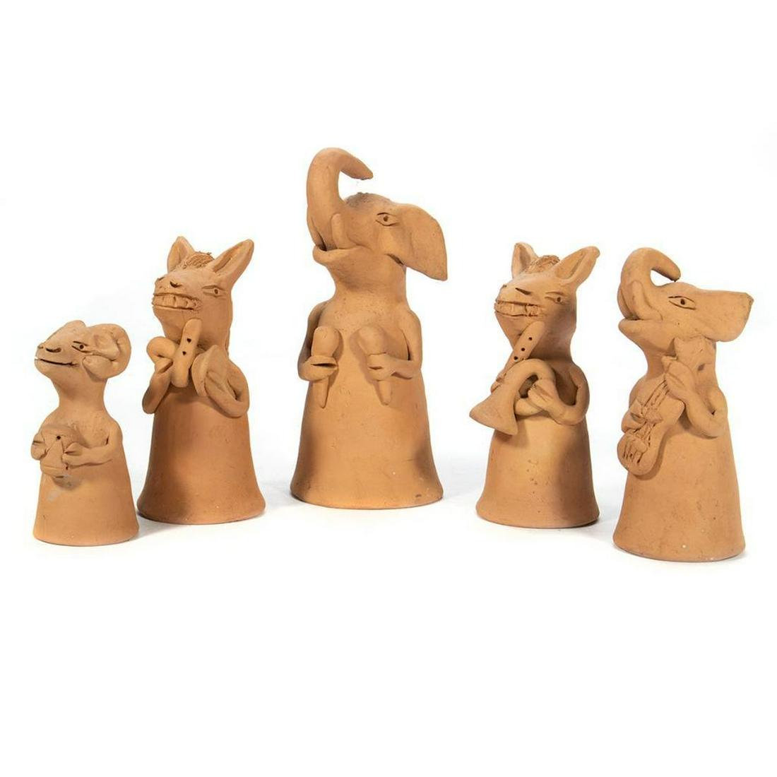 Collection of Folk Art Bells: Each in the form of a grinning animal. Greatest height 10in. Five total