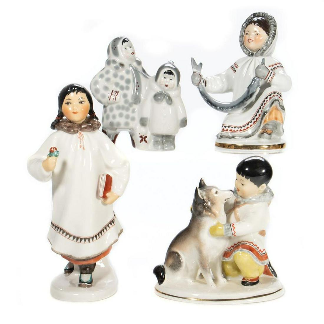 Russian Lomonosov Porcelain Yakut Figures: Three figures, all with red and black stamp and 'Made in USSR' on base, Greatest height 8in. Condition: Very good, no chips or cracks.