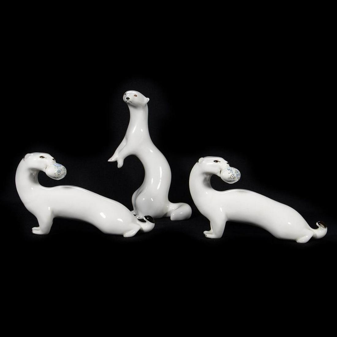Russian Lomonosov Porcelain Group: Ferrets and otter. Greatest height 9in. Condition: Very good, no chips or cracks