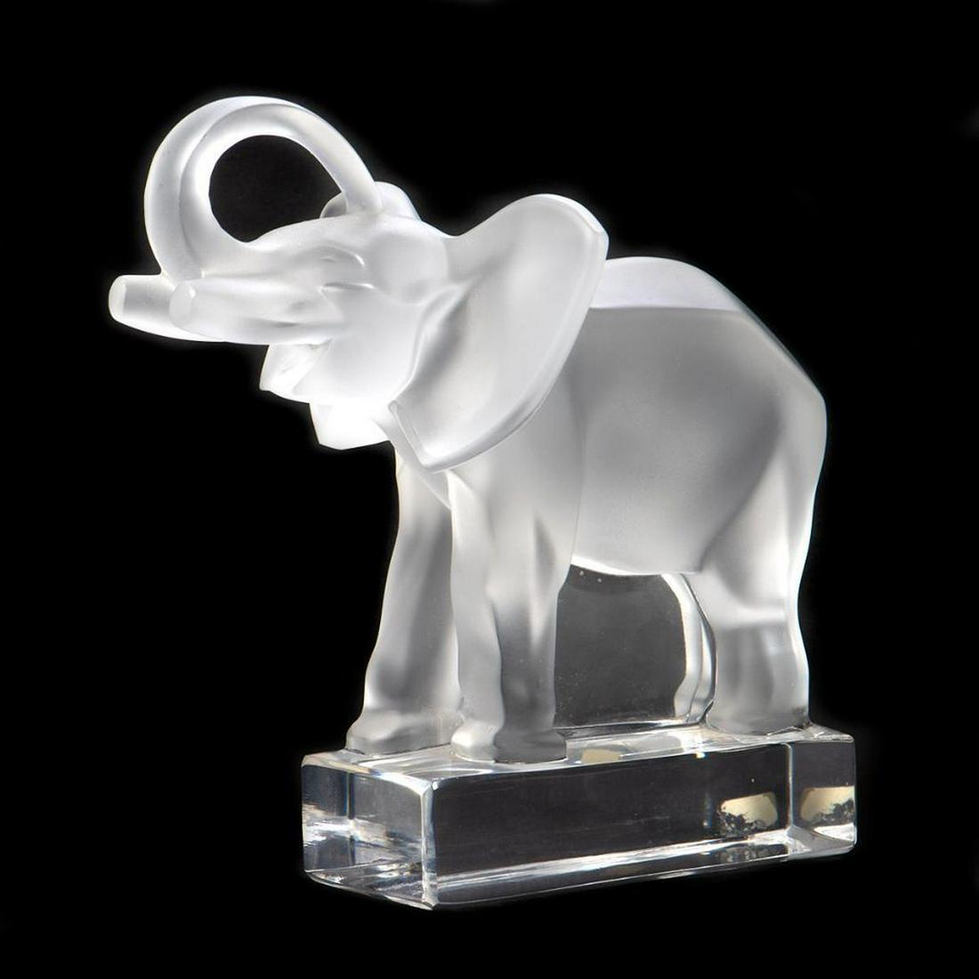 Lalique Clear and Frosted Glass Elephant: Height 6in. Condition:; Very good, no chips or cracks.