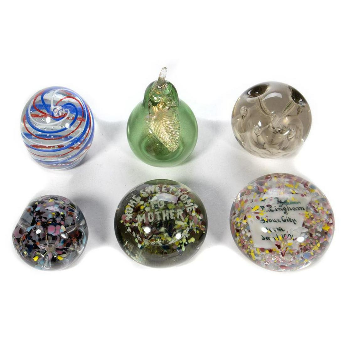 Collection of Glass Paperweights: Including Venetian and Texas Glass Co. Greatesgt height 5in. Condition: Very good, no chips or cracks. Six weights