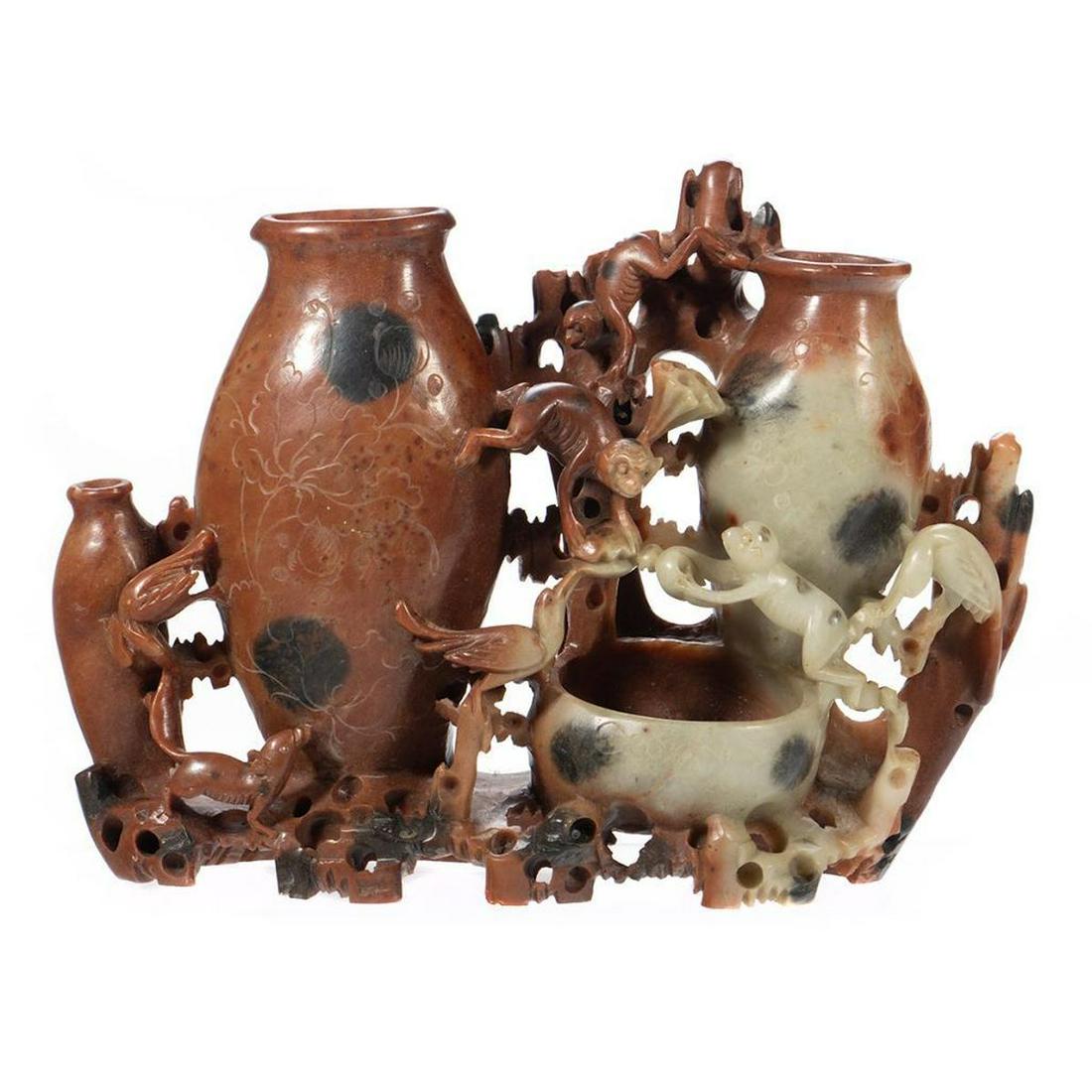 Chinese Carved Hardstone Vase: Carved with urns and monkeys. 6in. H. Condition: Very good.