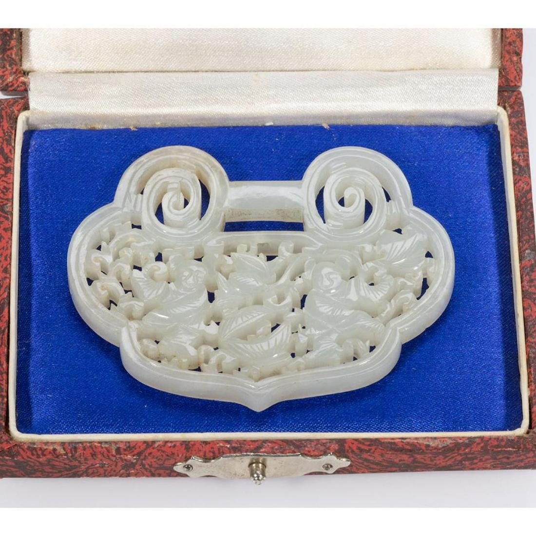 Chinese carved mutton fat jade pendant: measuring 2 3/4 x 2 1/4in. (very slight discoloration from age)