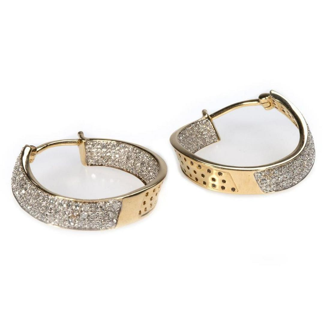 Pair of diamond and 14k gold hoop earrings: inside/outside design, set throughout with 200 single-cut diamonds, weighing in total an estimated 1.00ct.; weighing approximately 8.6 grams; length: 1in. (void one diamond)