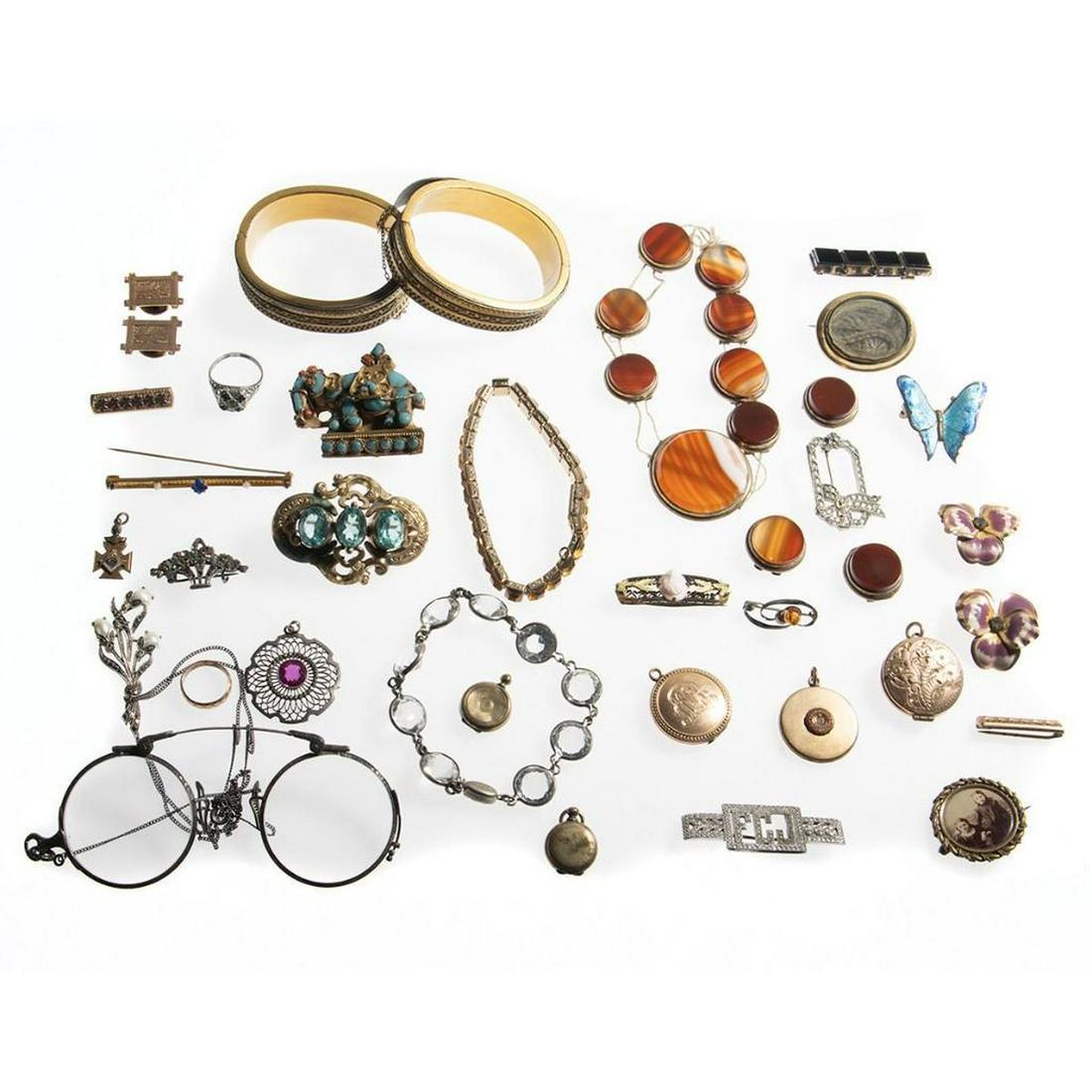 Collection of antique & period costume jewelry: including marcasite, paste, coral, onyx, rhinestone, enamel, agate, citrine, and glass, mounted in silver and metal; 5 bracelets, 1 necklace, 2 rings, 1 pair of eyeglasses, 7 pendants, 2 collar button