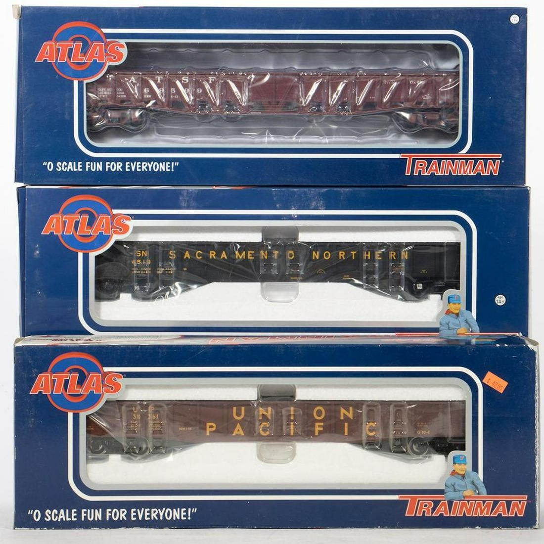 Atlas O Gauge. Gondolas. SF, UP, Sac. Northern: 2002855-3; New Old Stock; 52 foot 6 inch 70-Ton War Emergency Gondola Santa Fe Road Number 169599 [2 Rail] 0679-2; New Old Stock; 52 foot 6 inch Gondola Union Pacific Road Number 30361 [2 Rail] 0690-2