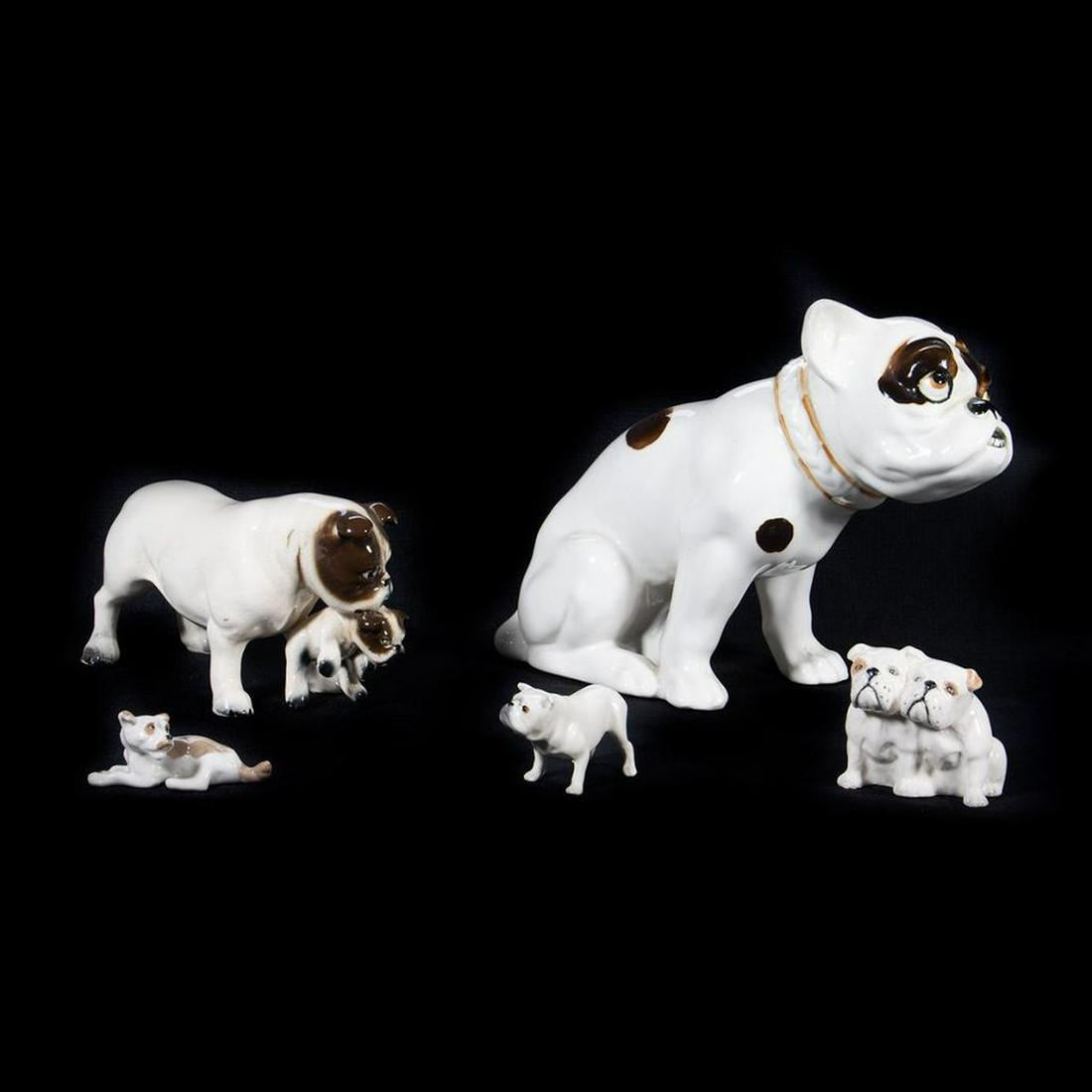 Czech and English Porcelain Group of Bulldogs: Greatest height 8in. Condition: Very good, no chips or cracks.