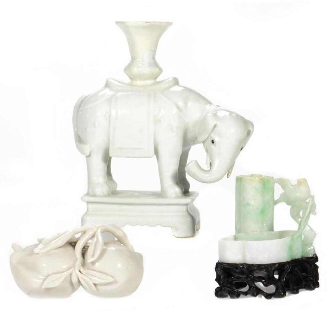 Group of Three Asian Decorative Objects, 19th Century: Group of three Asian decorative objects, 19th Century: 1. Porcelain elephant candlestick holder, 6 3/4" H x 6" x 3" W, unmarked, with old repairs. 2. Ceramic fruit with leaves, 2 1/8" x 4" x 2 1/8" D,