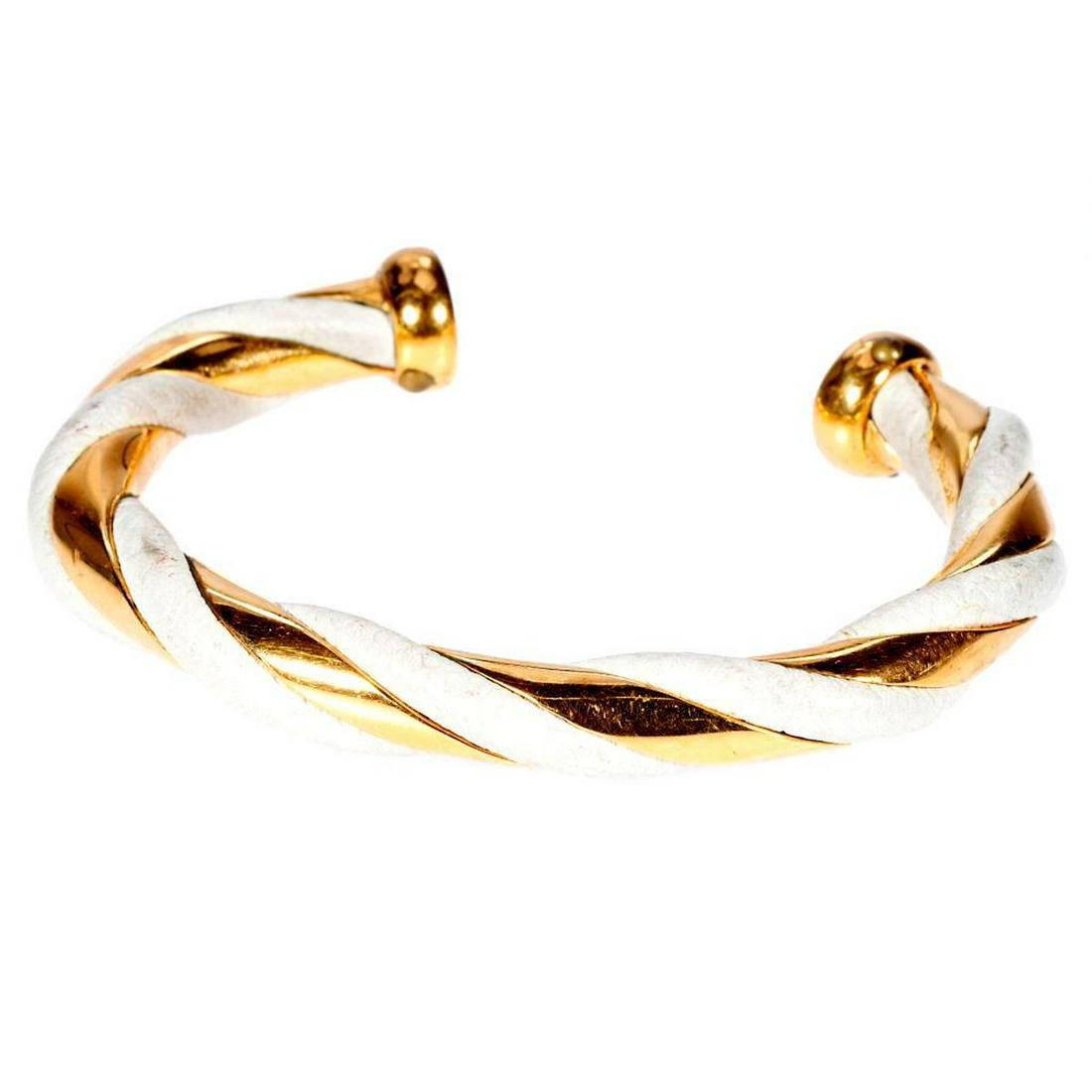 Hermes white leather and gold tone cuff bracelet (1 of 2)