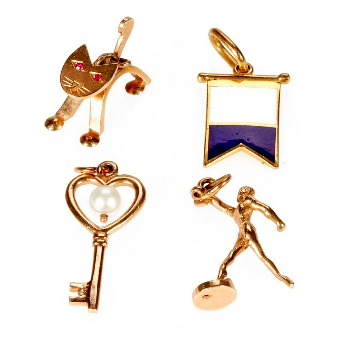 Four gold charms (1 of 5)