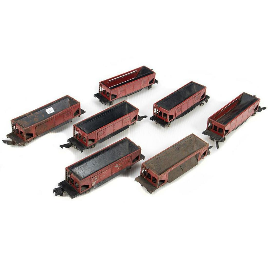 American Flyer 716 Dump Cars: 716Used716 Dump Cars: Red body, black frame, 1947 couplers, under truck pick up, flaking paint and rust spots in bin, ladders present but no brake wheel, trucks and couplers intact; Red body, black fr