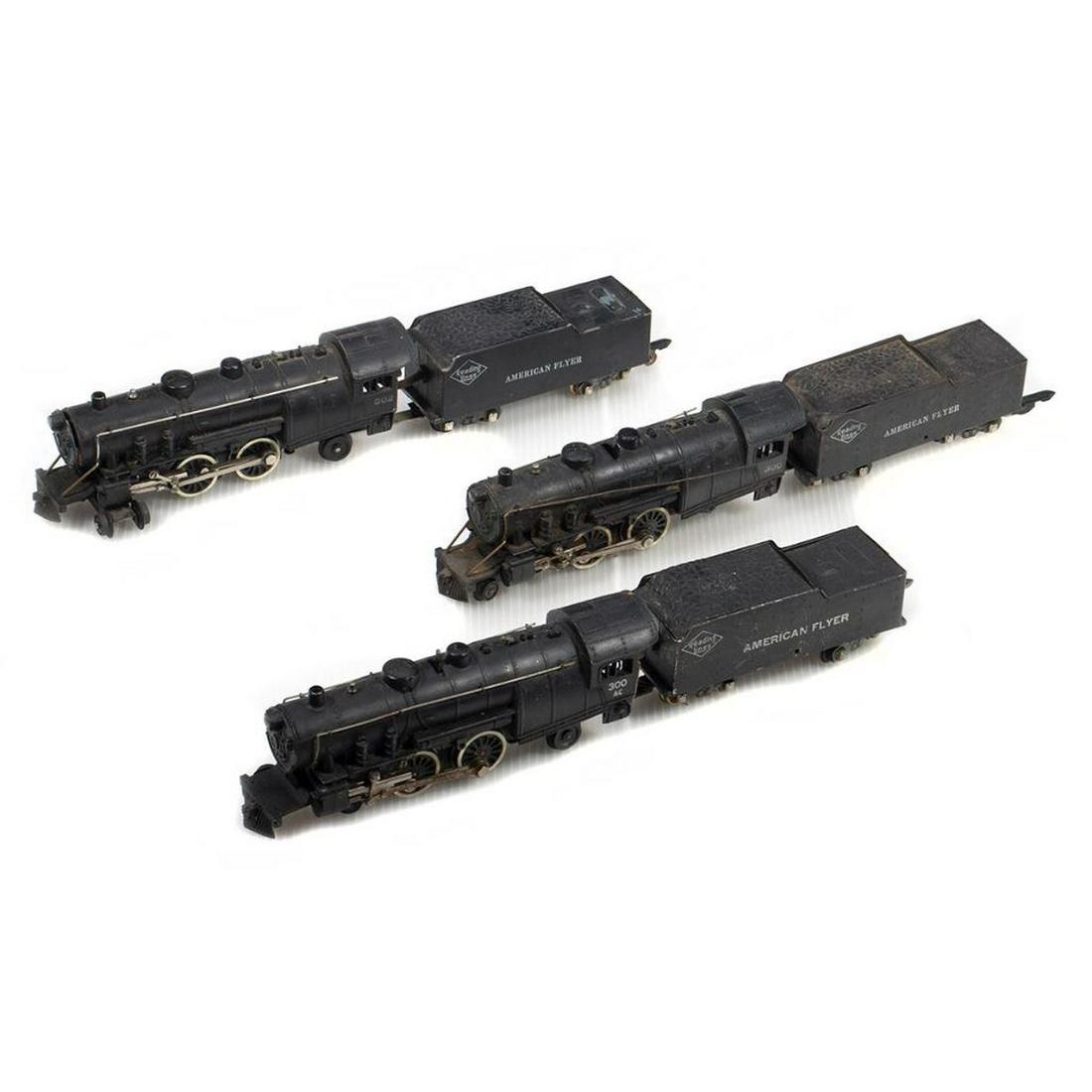 American Flyer S Gauge Atlantics/parts: 302Used302 Reading Lines 4-4-2 die cast locomotive and sheet metal tender with smoke in boiler, paint spots on rear of tender deck, 1948 coupler, weak numbering under cab windows, wiring harness needs