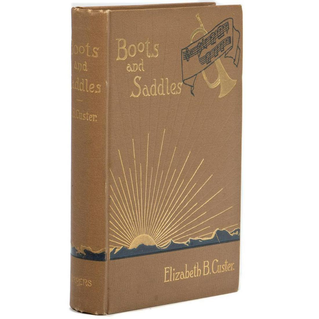 Boots and Saddles, by Elizabeth B. Custer: CUSTER, ELIZABETH B. Boots and Saddles, or Life in Dakota with General Custer. New York: Harper & Bros., 1885. 12mo. Light brown blindstamped cloth with dark blue and gilt pictorial cover. Very Good; 